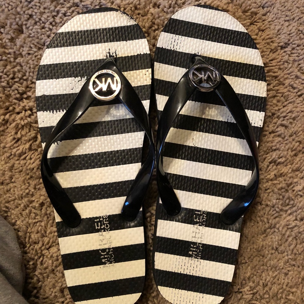 MK sandals slight wear by toes.